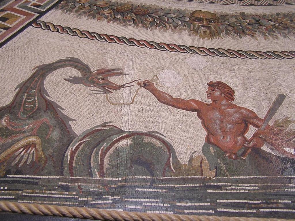 Colorful mosaic depiction of man and dragon, on floor of Vatican Museum.